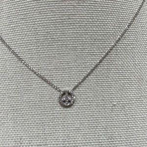 White gold diamond peace necklace